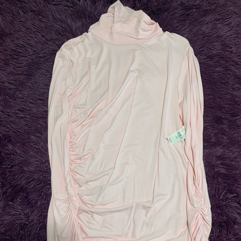 Light pink ruched turtleneck shirt